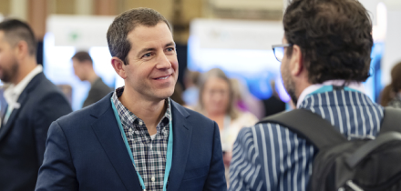 Attendees networking at Gartner conference, fostering meaningful interactions and connections among peers and experts.