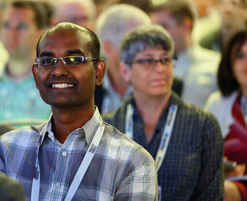 A person attending Gartner IT Symposium/Xpo in Kochi