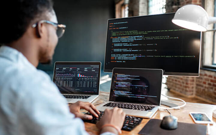 A person working on his cybersecurity project