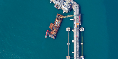 Boats in harbor representing a visual for supply chain