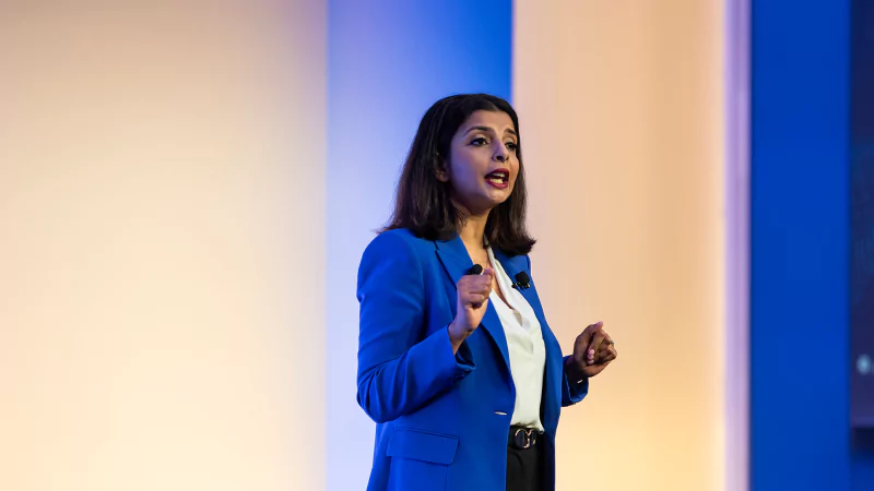 Attendees engaging at Gartner conference, accessing exclusive blockbuster research for competitive advantage.