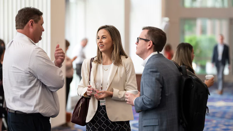 Speaker delivering keynote at Gartner conference, offering visionary insights and innovative perspectives.