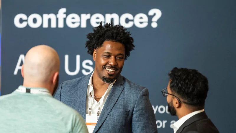 Industry leaders collaborating at Gartner conference to solve shared challenges and make informed decisions.