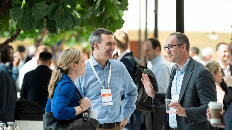Attendees networking at Gartner conference, fostering meaningful interactions and connections among peers and experts.