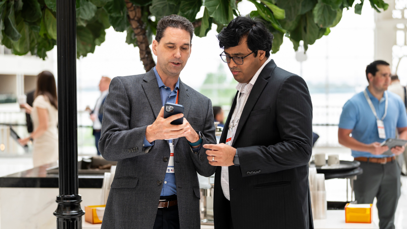 People speaking to each other at a Gartner Conference