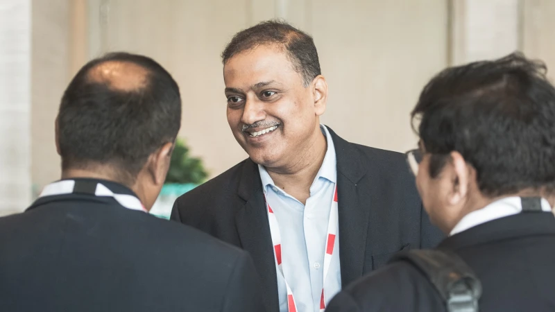 Attendees networking at a Gartner conference
