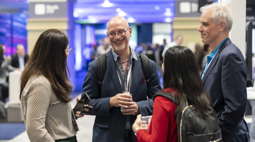 Attendees networking at a Gartner conference