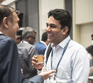 People speaking to each other at Gartner IOCS