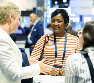 Attendees networking with peers and solution providers at Gartner CIO Leadership Forum.