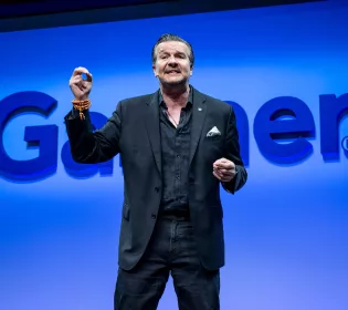 Leigh McMullen and Christine Lee speaking on stage