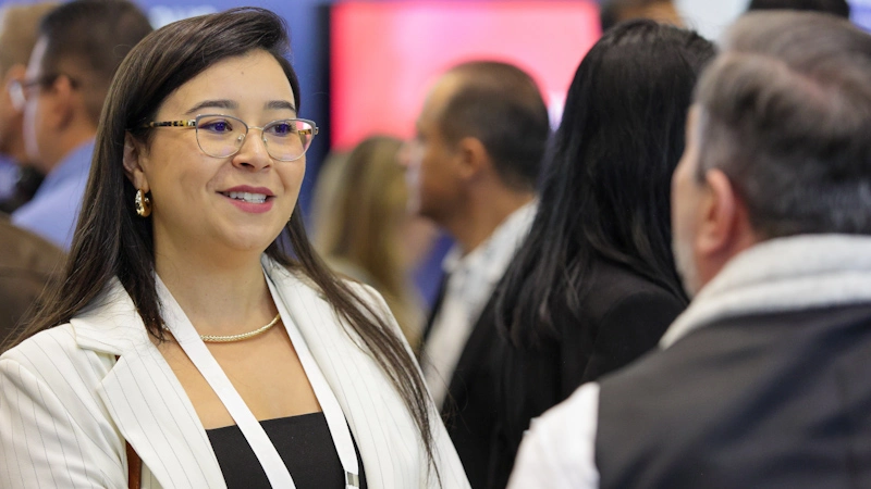 Attendees networking at Gartner conference, fostering meaningful interactions and connections among peers and experts.