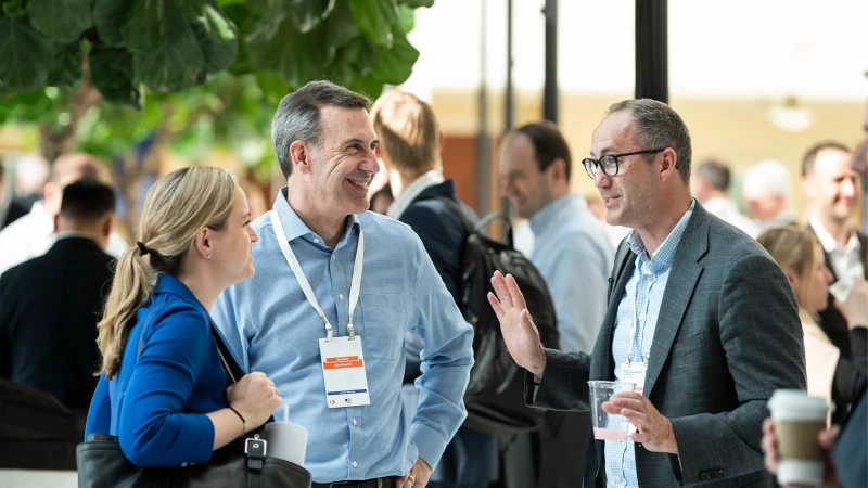 Attendees networking at Gartner conference, fostering meaningful interactions and connections among peers and experts.