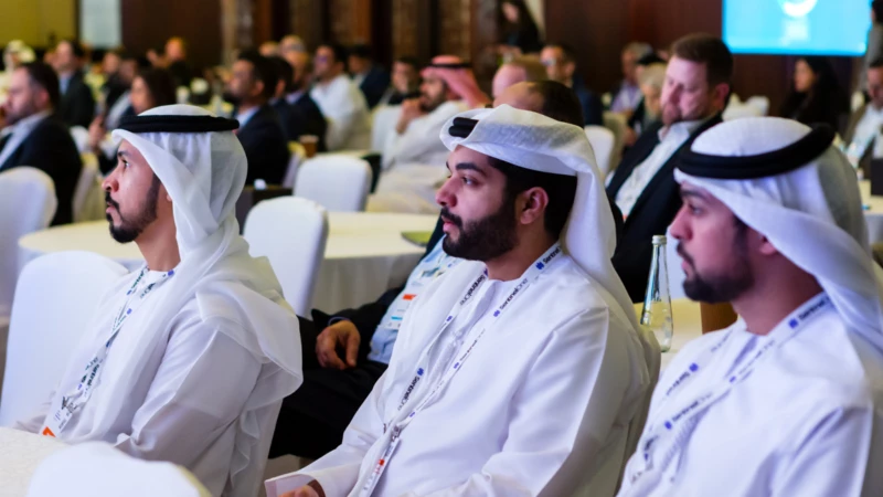 Speaker presenting at Gartner conference, emphasizing data-driven research and expert insights.