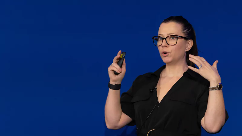 Attendees at Gartner conference, emphasizing data-driven insights and expert insights.