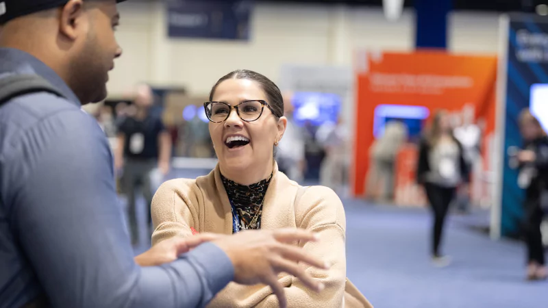 Attendees networking at Gartner conference, fostering meaningful interactions and connections among peers and experts.