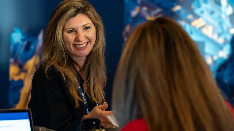 Attendees networking at a Gartner conference