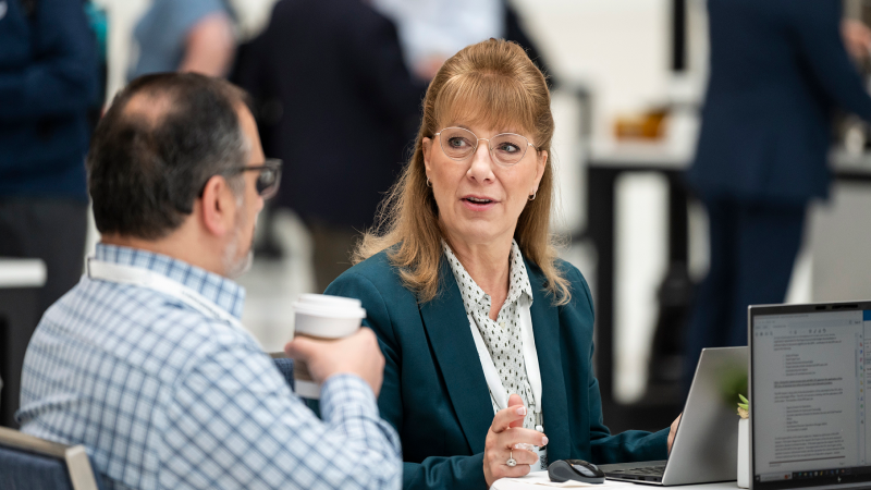 A digital workplace team sharing insights at Gartner Digital Workplace Summit.
