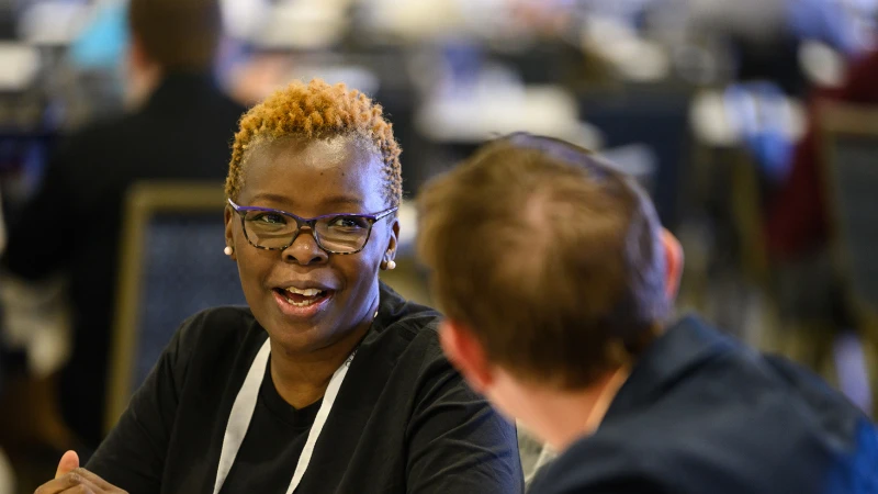 Attendees networking at a Gartner conference