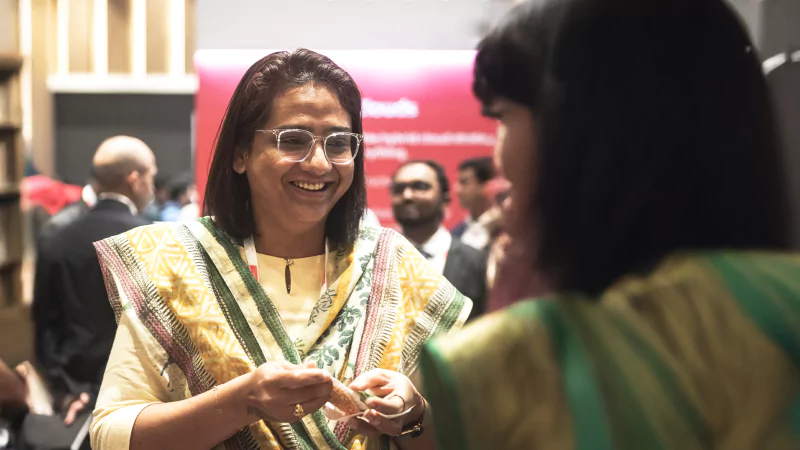 People speaking to each other at a Gartner Conference