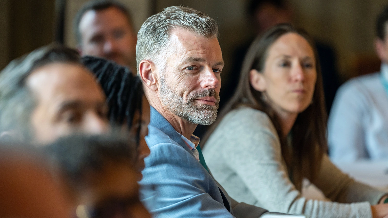 Attendee in deep thought at supply chain conference