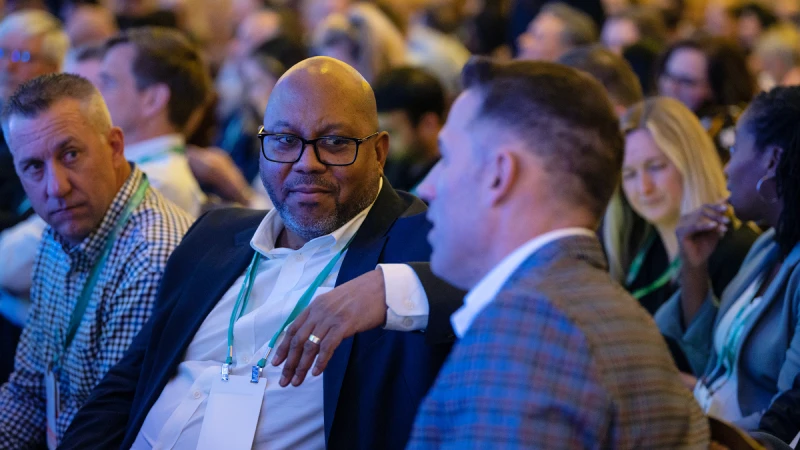 Attendees networking at a Gartner conference