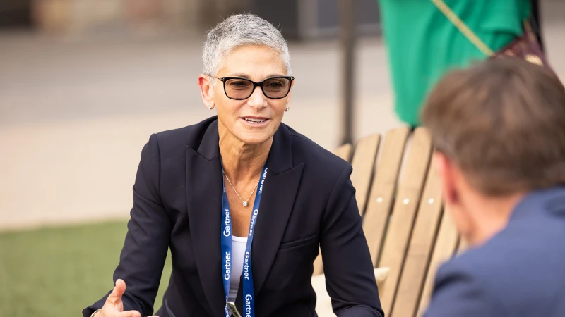 Attendees networking at Gartner conference, fostering meaningful interactions and connections among peers and experts.