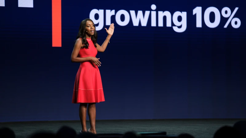 Speaker delivering keynote at Gartner conference, offering visionary insights and innovative perspectives.