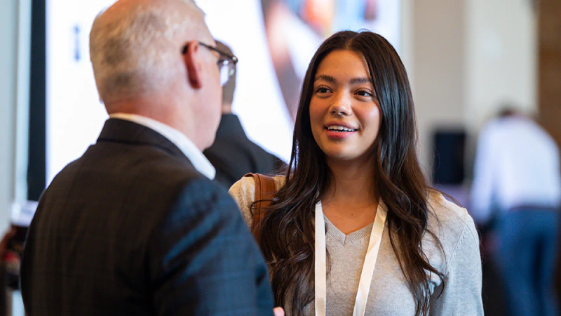 Attendees networking at Gartner conference, fostering meaningful interactions and connections among peers and experts.