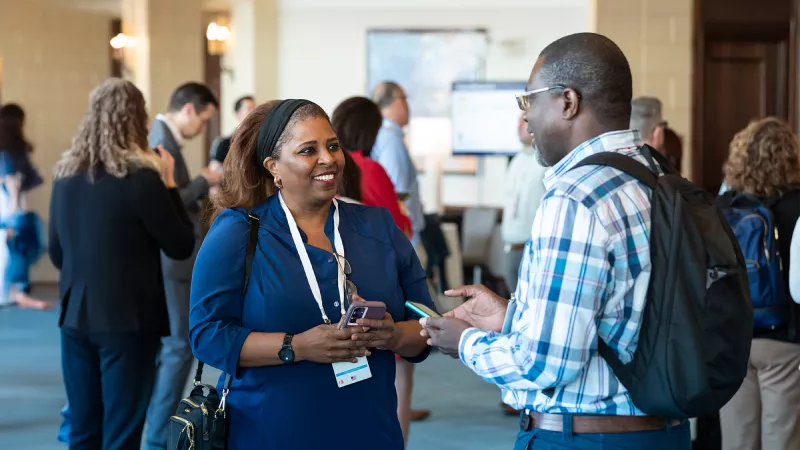 Attendees networking at Gartner conference, fostering meaningful interactions and connections among peers and experts.