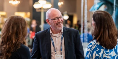 Illustration of HR leaders collaborating to solve challenges, vet strategies, and make informed decisions together