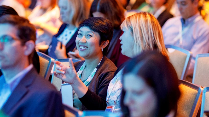 Attendees engaging at Gartner conference, accessing exclusive blockbuster research for competitive advantage.