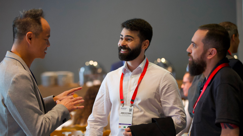 Attendees networking at Gartner conference, fostering meaningful interactions and connections among peers and experts.