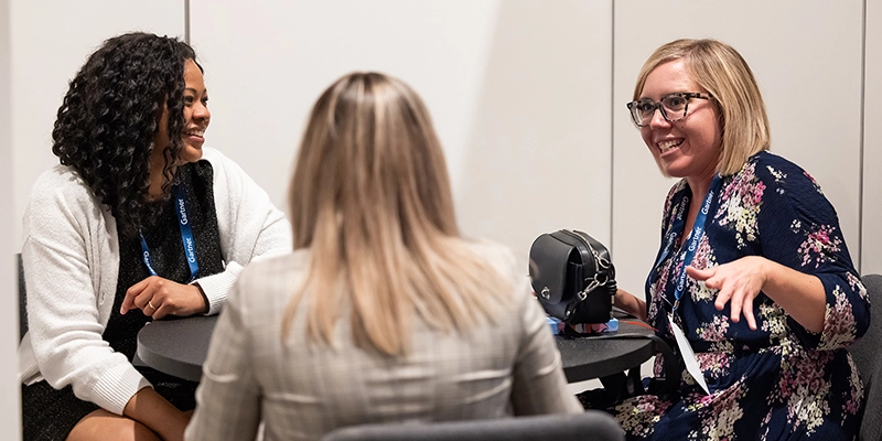 Attendees networking at Gartner conference, fostering meaningful interactions and connections among peers and experts.