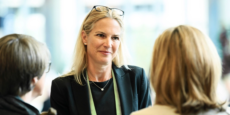 Attendees networking at Gartner conference, fostering meaningful interactions and connections among peers and experts.