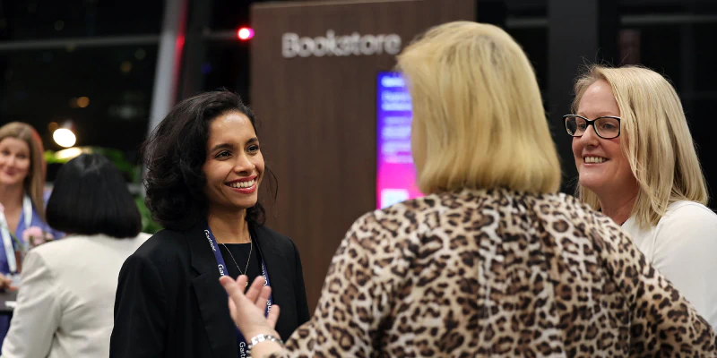 Attendees networking at Gartner conference, fostering meaningful interactions and connections among peers and experts.