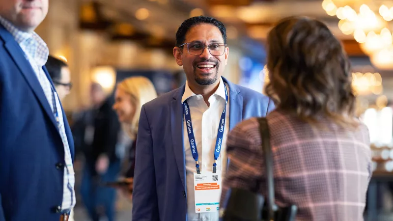Attendees networking at Gartner conference, fostering meaningful interactions and connections among peers and experts.