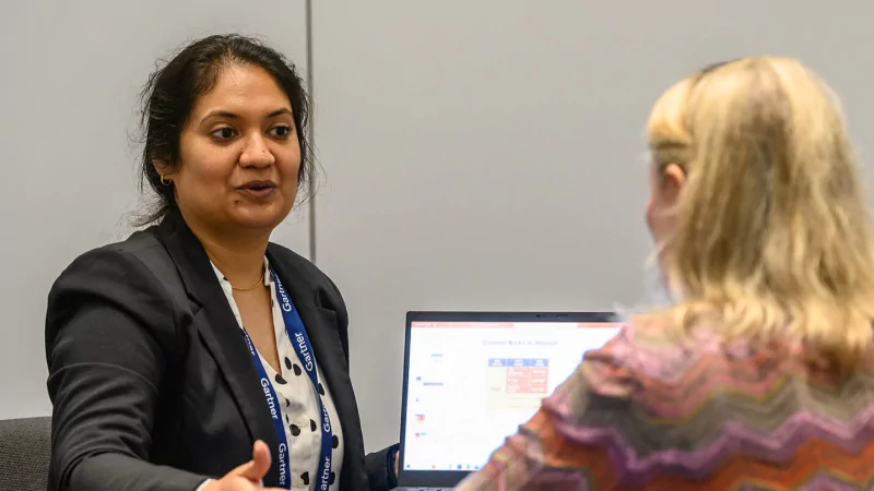 Expert speaking at Gartner conference, offering strategic validation through proprietary research and tools.