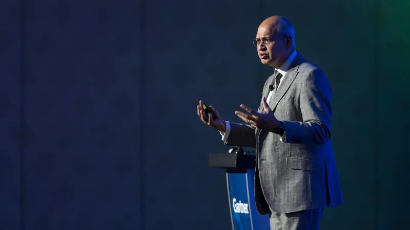 Attendees engaging at Gartner conference, accessing exclusive blockbuster research for competitive advantage.