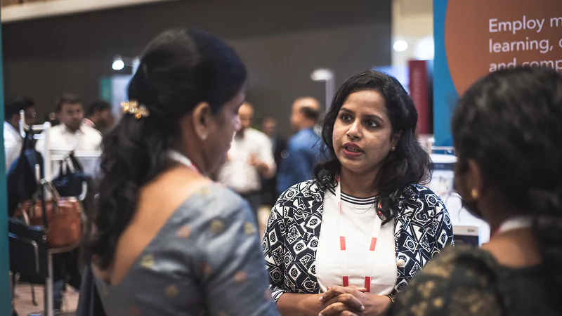 Industry leaders collaborating at Gartner conference to solve shared challenges and make informed decisions.