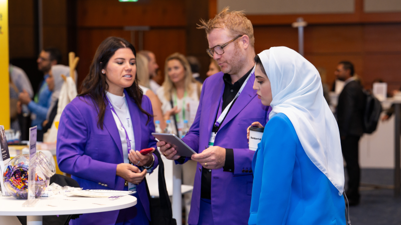 Attendees interacting with Exhibitors