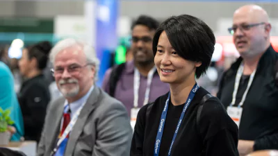 Attendees engage with vendors in their live product demos