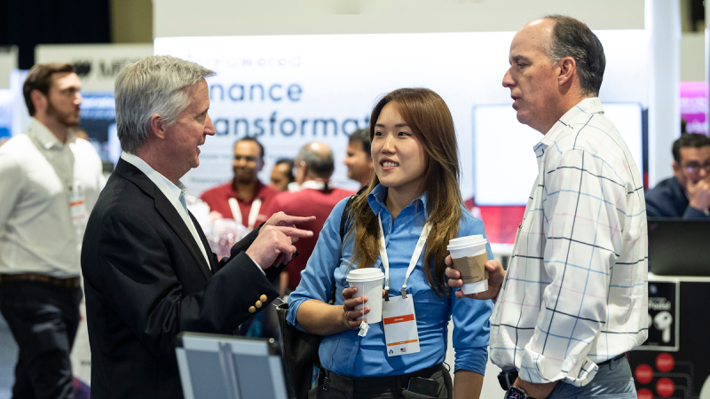 Attendees and exhibitors talking amongst themselves building connections at the Gartner Application Innovation & Business Solutions Summit