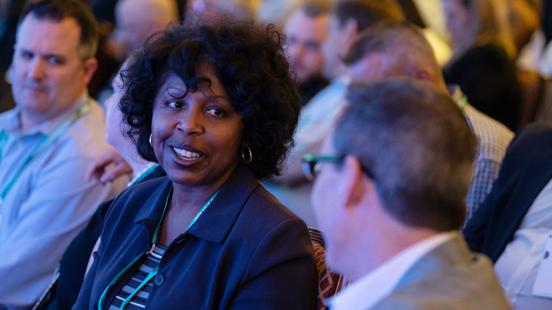 Industry leaders collaborating at Gartner conference to solve shared challenges and make informed decisions.