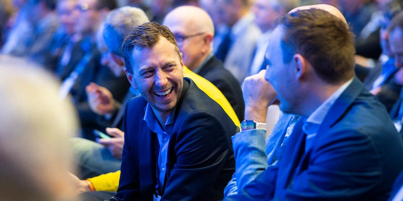 Attendees networking at Gartner conference, fostering meaningful interactions and connections among peers and experts.