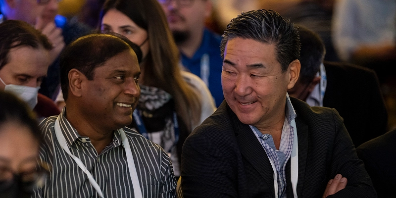 Industry leaders collaborating at Gartner conference to solve shared challenges and make informed decisions.