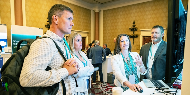 Supply chain leaders looking at a walkthrough of a solution 