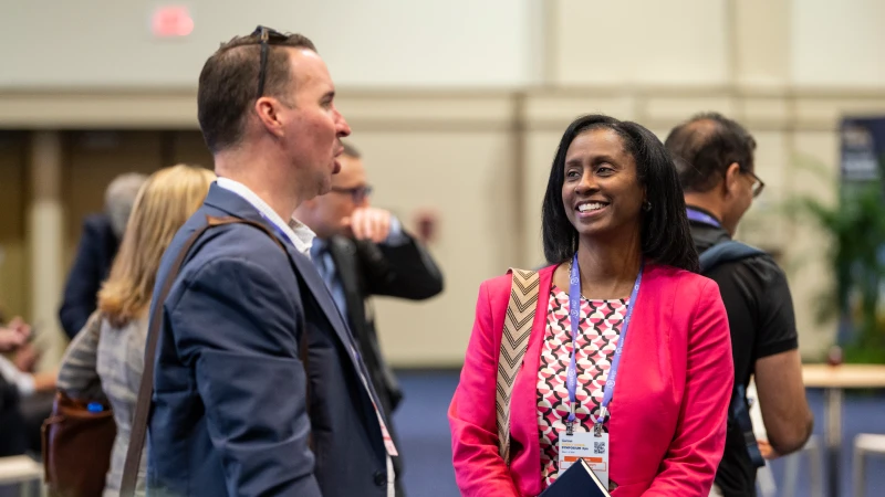 Attendees networking at Gartner conference, fostering meaningful interactions and connections among peers and experts.