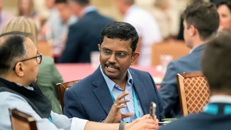 Attendees networking at Gartner conference, fostering meaningful interactions and connections among peers and experts.