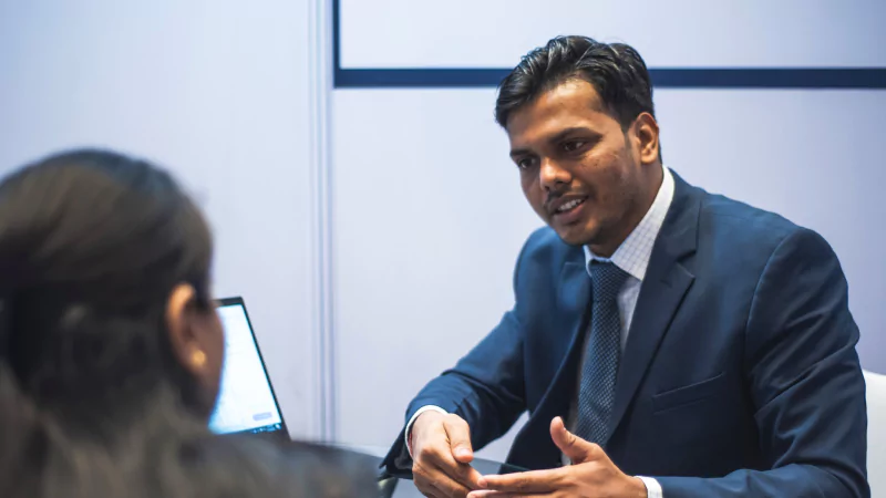 Attendees networking at Gartner conference, fostering meaningful interactions and connections among peers and experts.