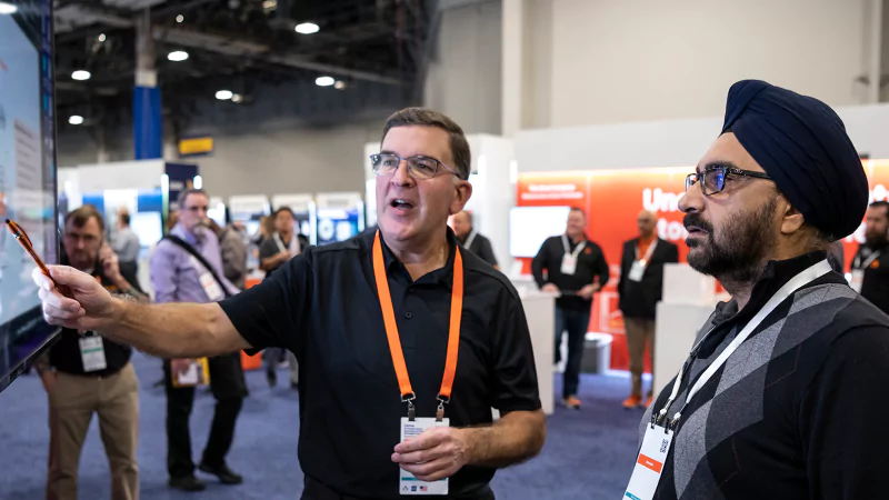 Someone having a one-on-one conversation on their most pressing issues at a Gartner Conference